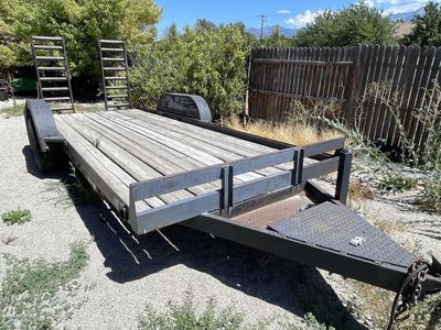 Heavy duty 18’ flatbed trailer with ramps