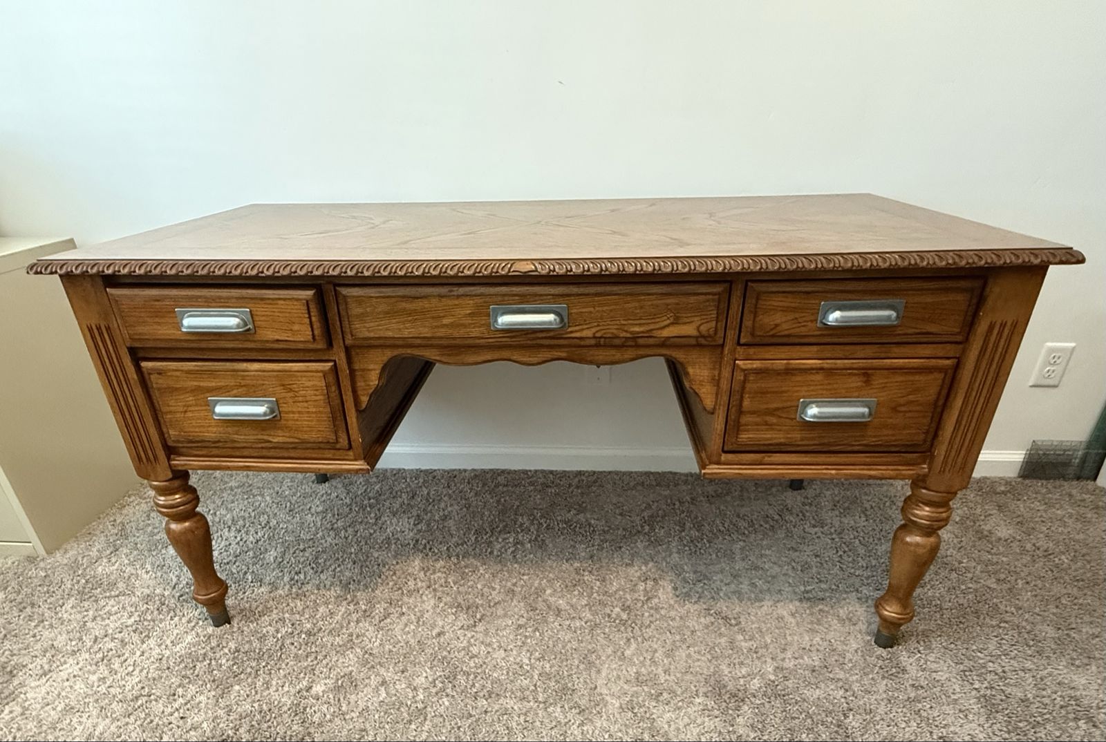 Vintage Wooden Executive Desk with Five Storage Drawers and Ornate Trim