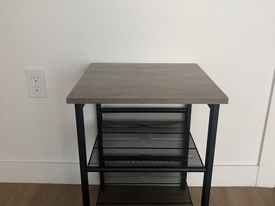 Side table with mesh shelves