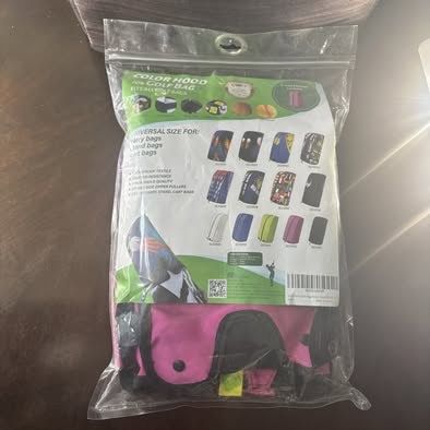 9-Golf 360 brand golf grips featuring a pink and teal leopard print design + Sandian branded golf bag rain hood is designed