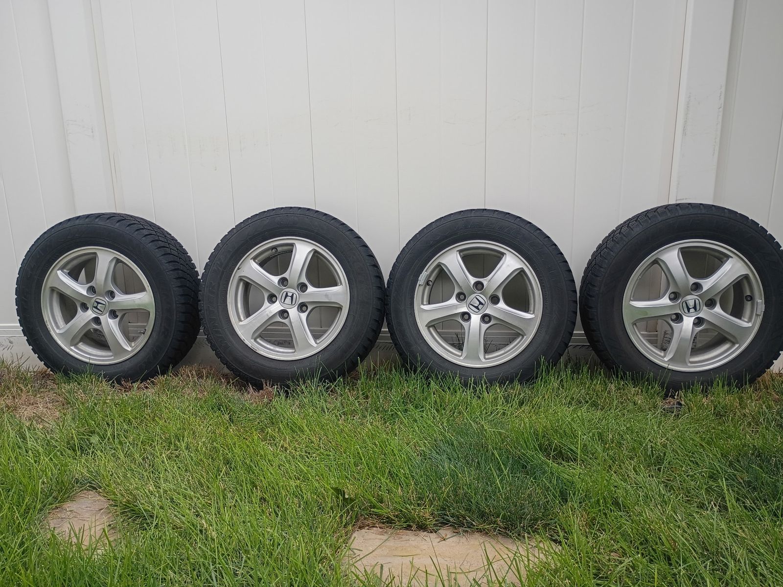 Four snow tires with rims nearly new condition