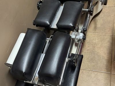 Used Black Chiropractic Adjustment Table with Adjustable Cushions