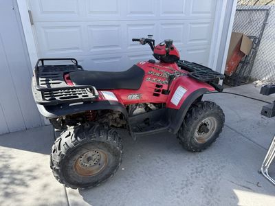 Polaris 500 HO W/ Winch & plow