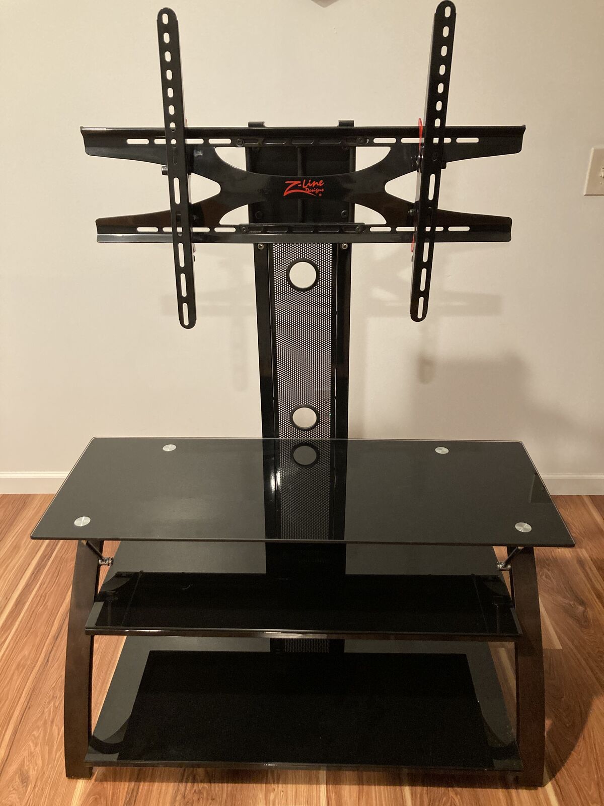 Glass TV stand with ZLine TV mount can hold up to 60" TV