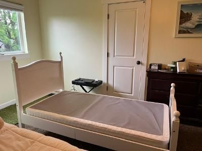 Twin bed with box springs and comforter