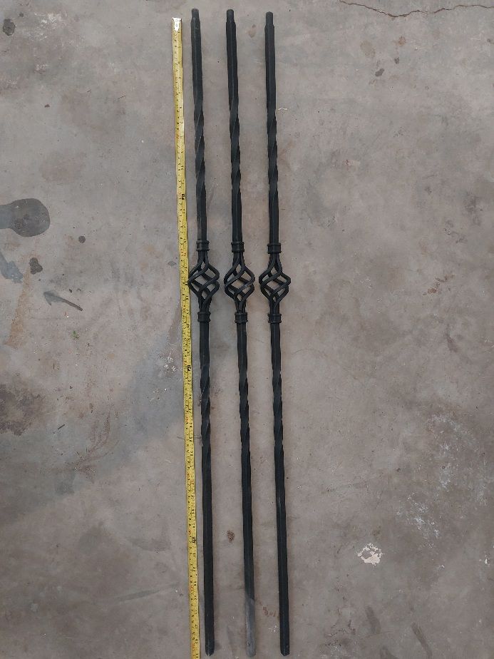 Fancy black metal balusters (spindles) for stair railing
