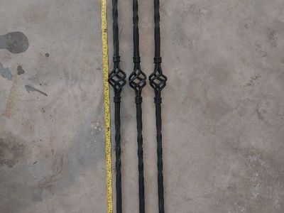 Fancy black metal balusters (spindles) for stair railing