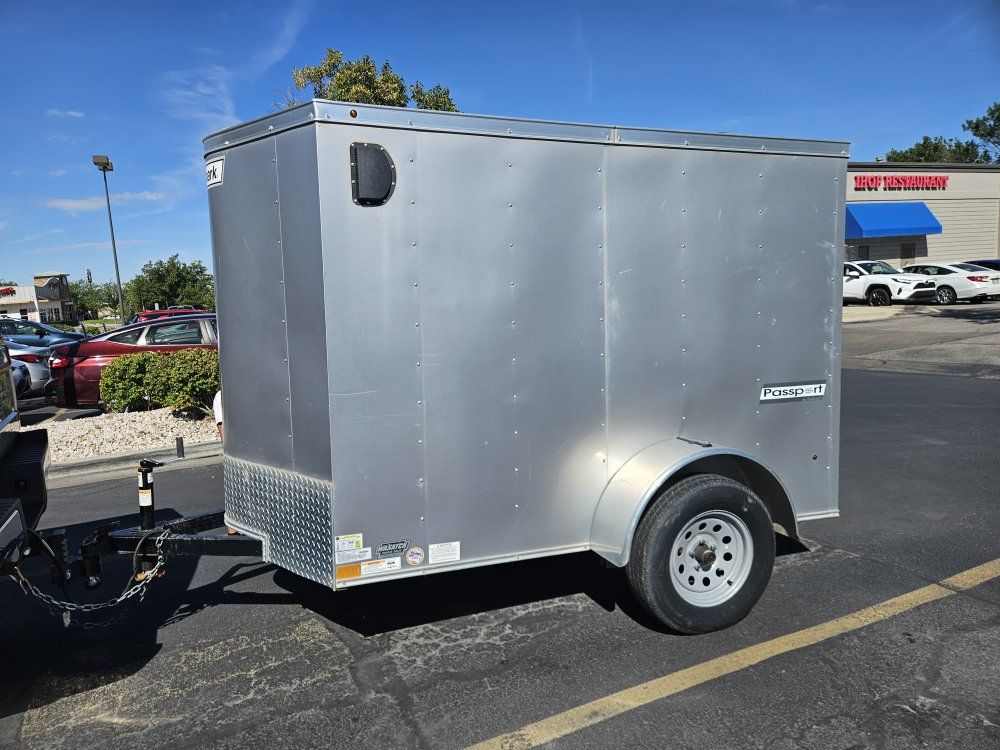 like new 2022 5x8 + v nose Haulmark Passport Enclosed Cargo Trailer - Silver