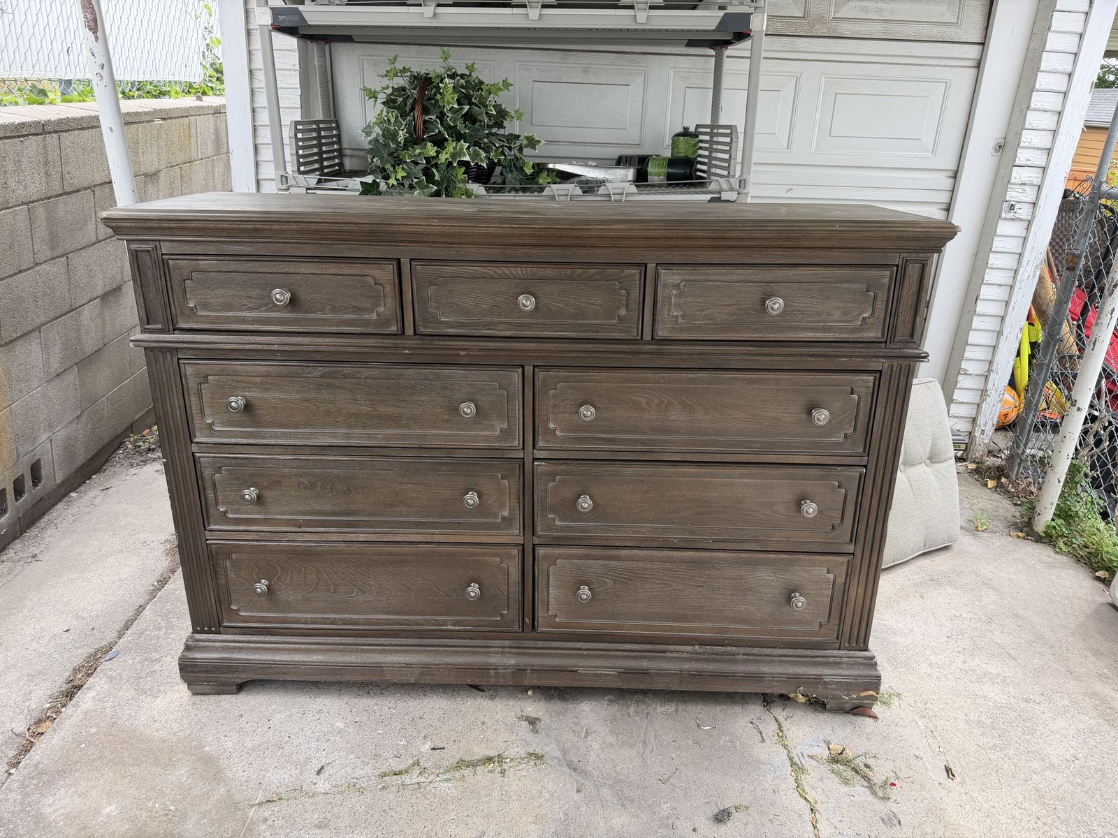 9-Drawer Dark Brown Wood Dresser for a flip