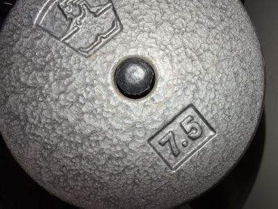 8 weight plates 7.5 lbs