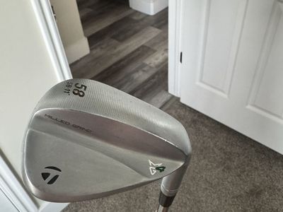 TaylorMade 58 degree SB 11 milled grind wedge with midsize CP2 wrap grip and dynamic gold shaft