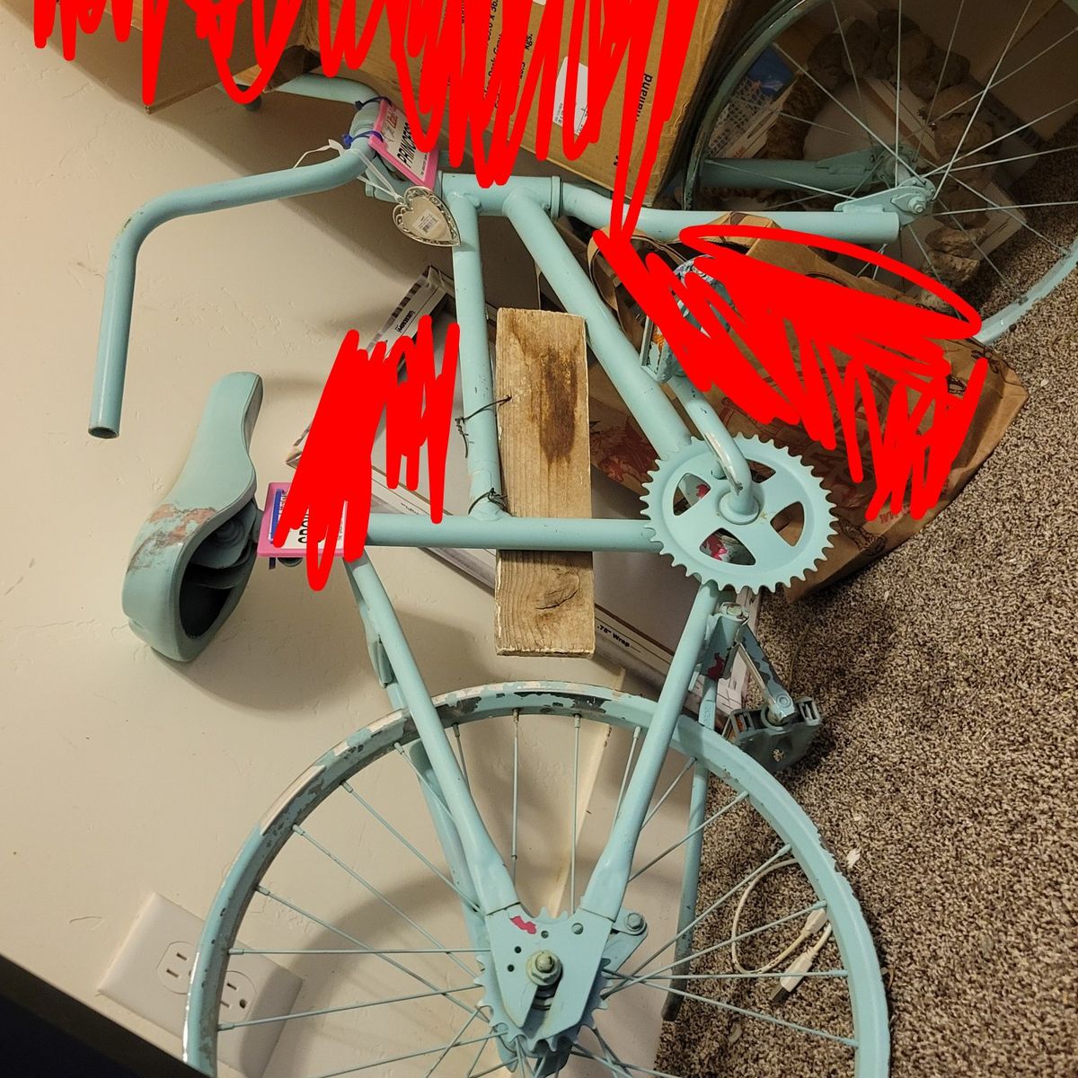 turquoise metal display bike
