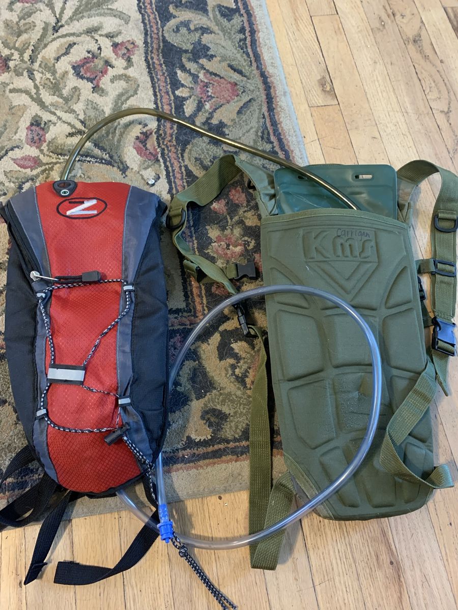 Set of 2 water hydration backpack, like camelbacks, works great with for trek or hiking