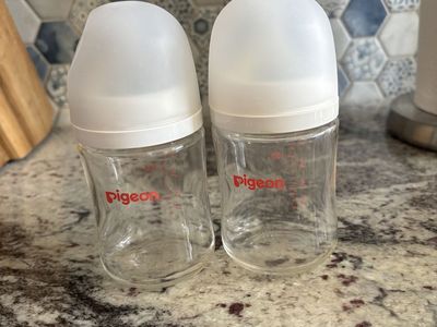 Pigeon glass bottles