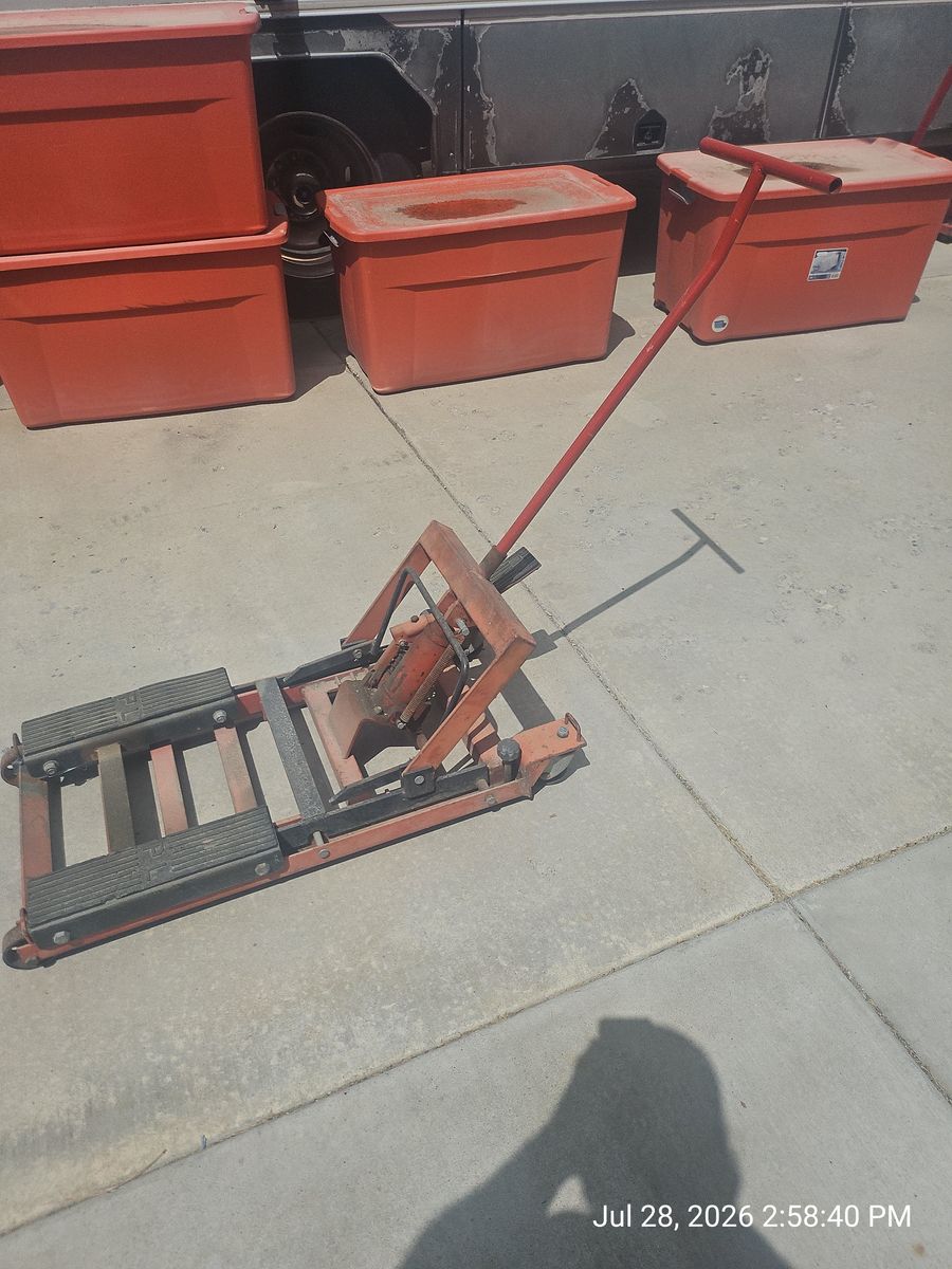 Used Hydraulic Foot Pump Cart Jack for Motorcycle Repair and Lifting