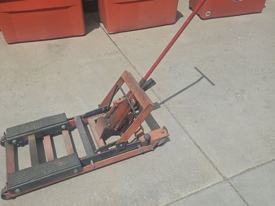 Used Hydraulic Foot Pump Cart Jack for Motorcycle Repair and Lifting