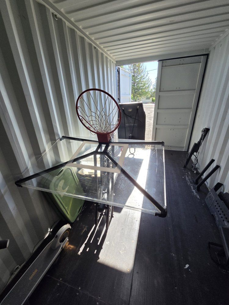 Silver back adjustable basketball hoop.
