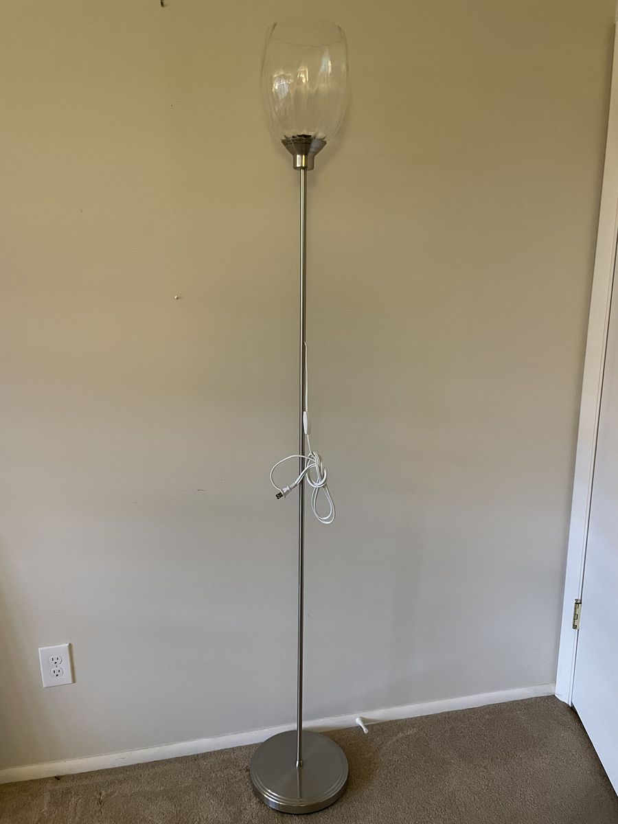 Floor lamp with clear glass shade