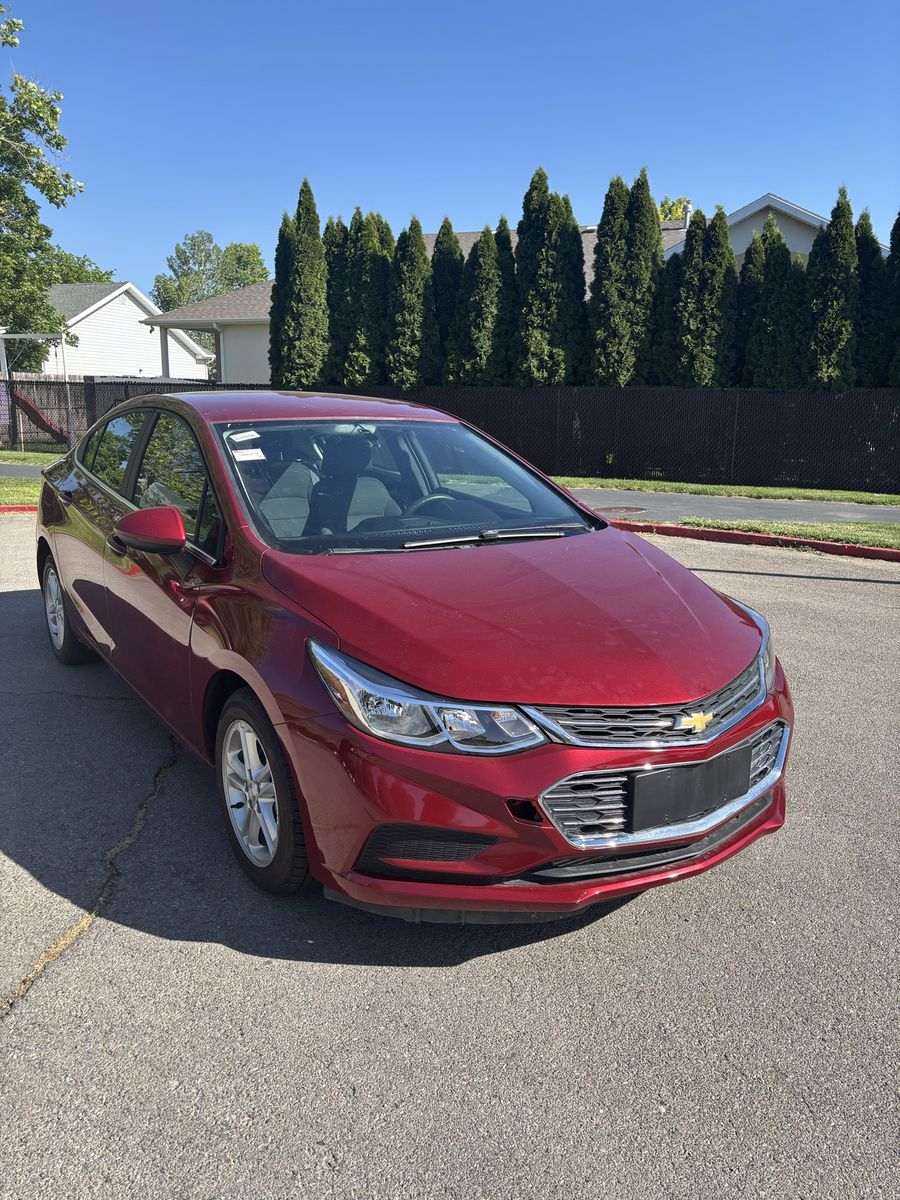 2018 Chevrolet Cruze — rebuilt & branded title, 10% below market