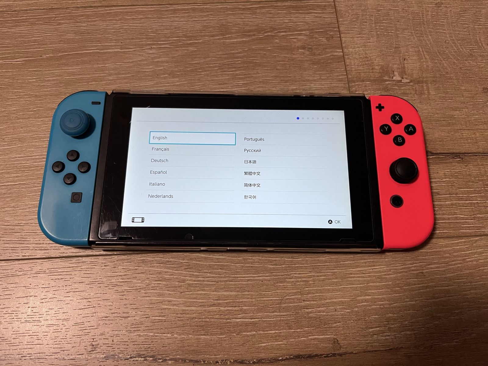 Nintendo Switch with memory card, carry case, and extra charging cord