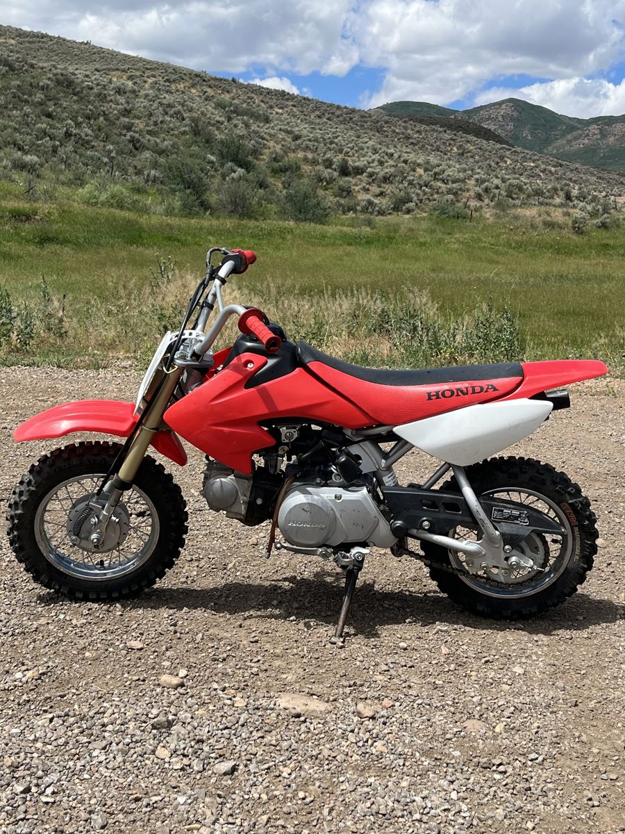 2008 Honda CRF 50 title in hand