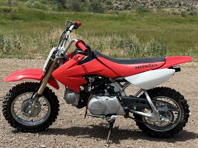 2008 Honda CRF 50 title in hand
