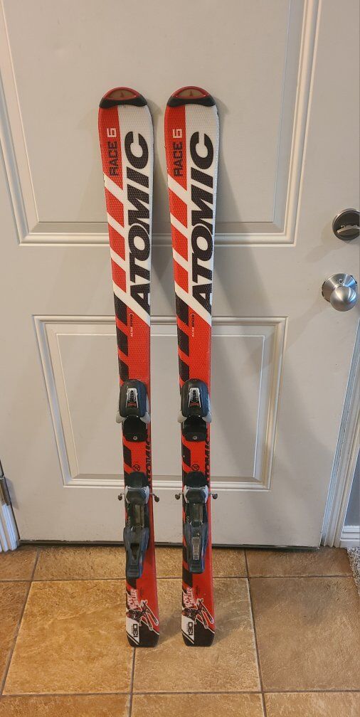 atomic 130cm skis (boots avail)
