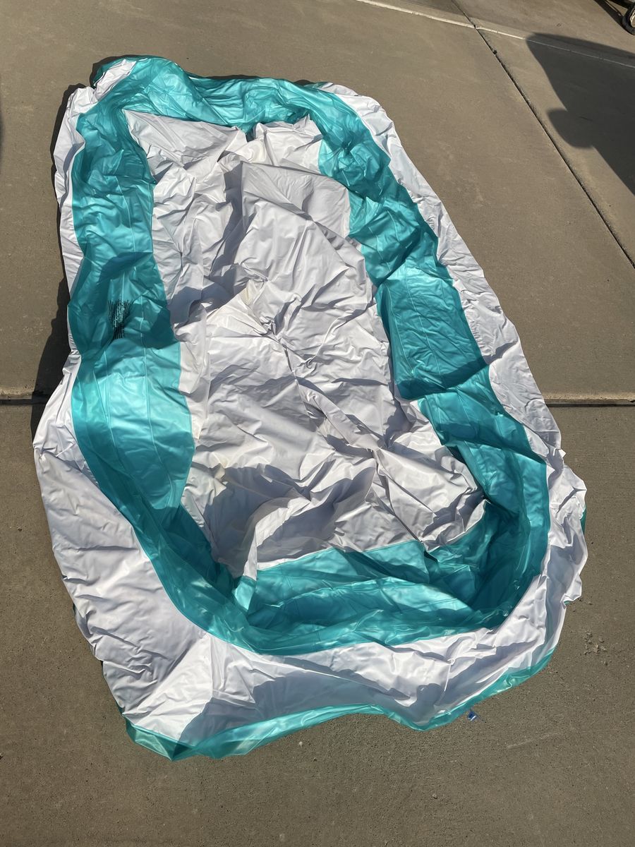 Large Inflatable Kiddie Pool - White and Teal, Durable Plastic, Fun for Summer
