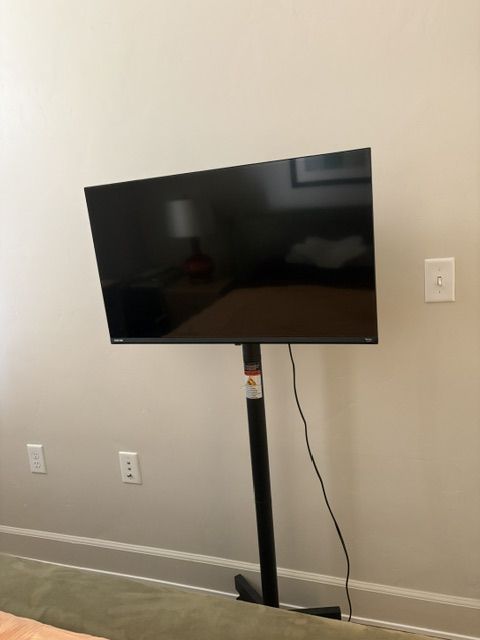 32" Toshiba Smart TV with Stand and Wheels. Hardly used.