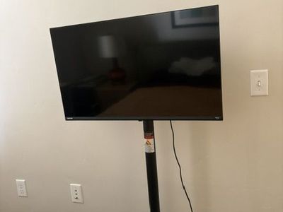 32" Toshiba Smart TV with Stand and Wheels. Hardly used.