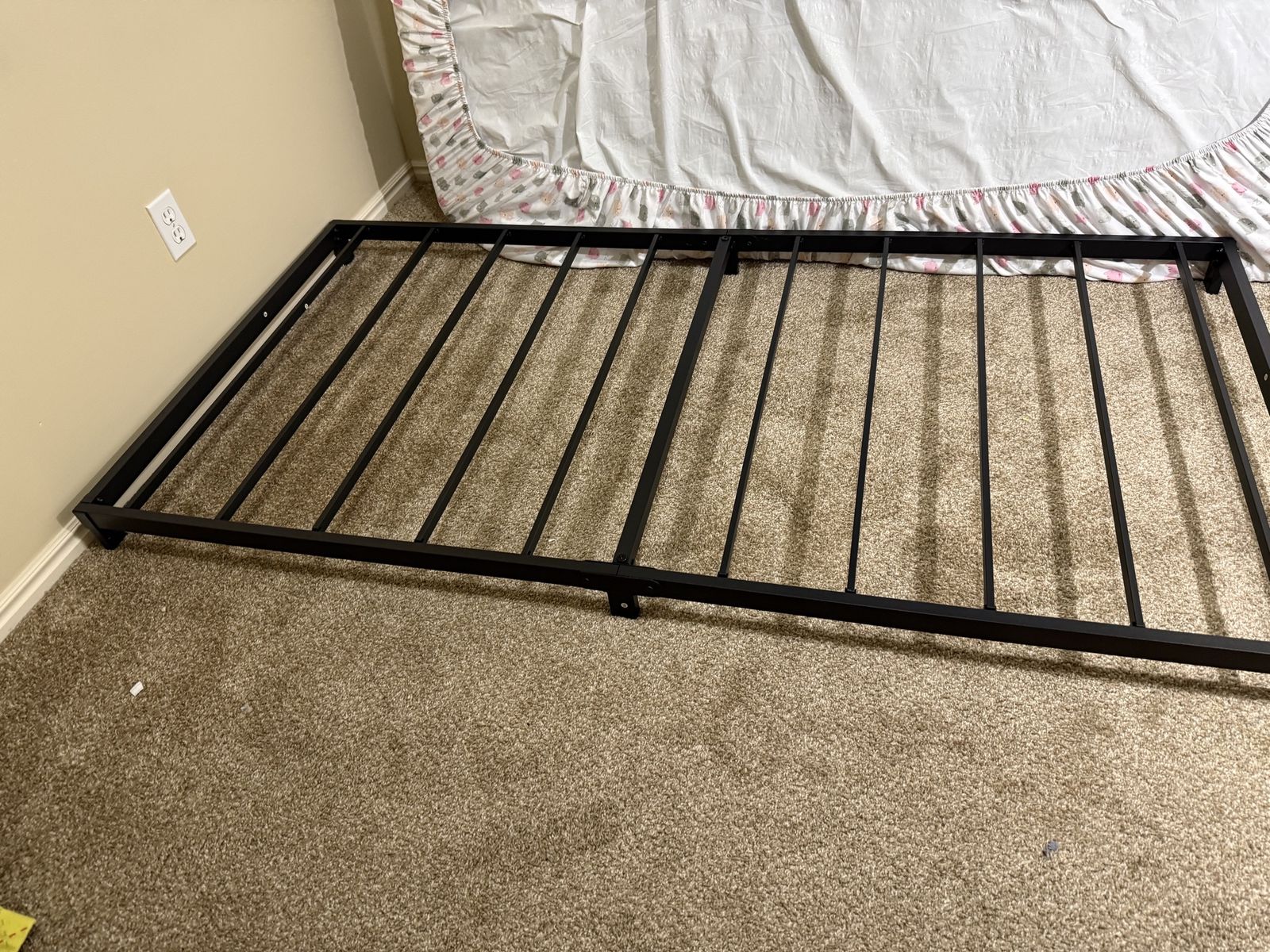 Twin Size Black Metal bed low on the ground for fall risk
