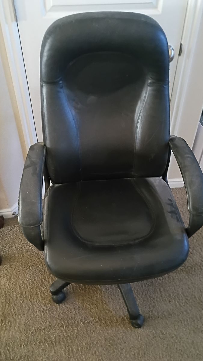 Large Leather adjustable Office Chair on rollers. (used 10 years old)