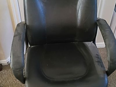Large Leather adjustable Office Chair on rollers. (used 10 years old)