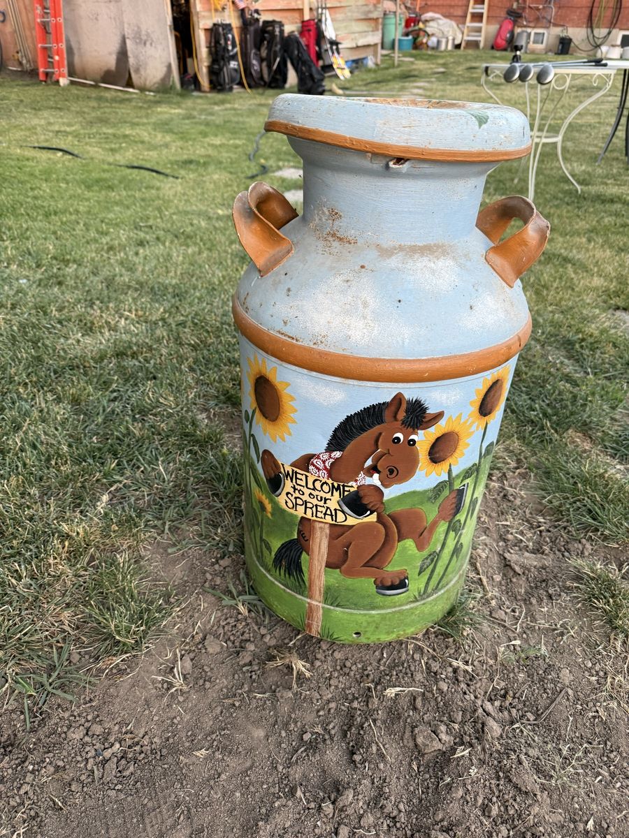 Milk can.  Large