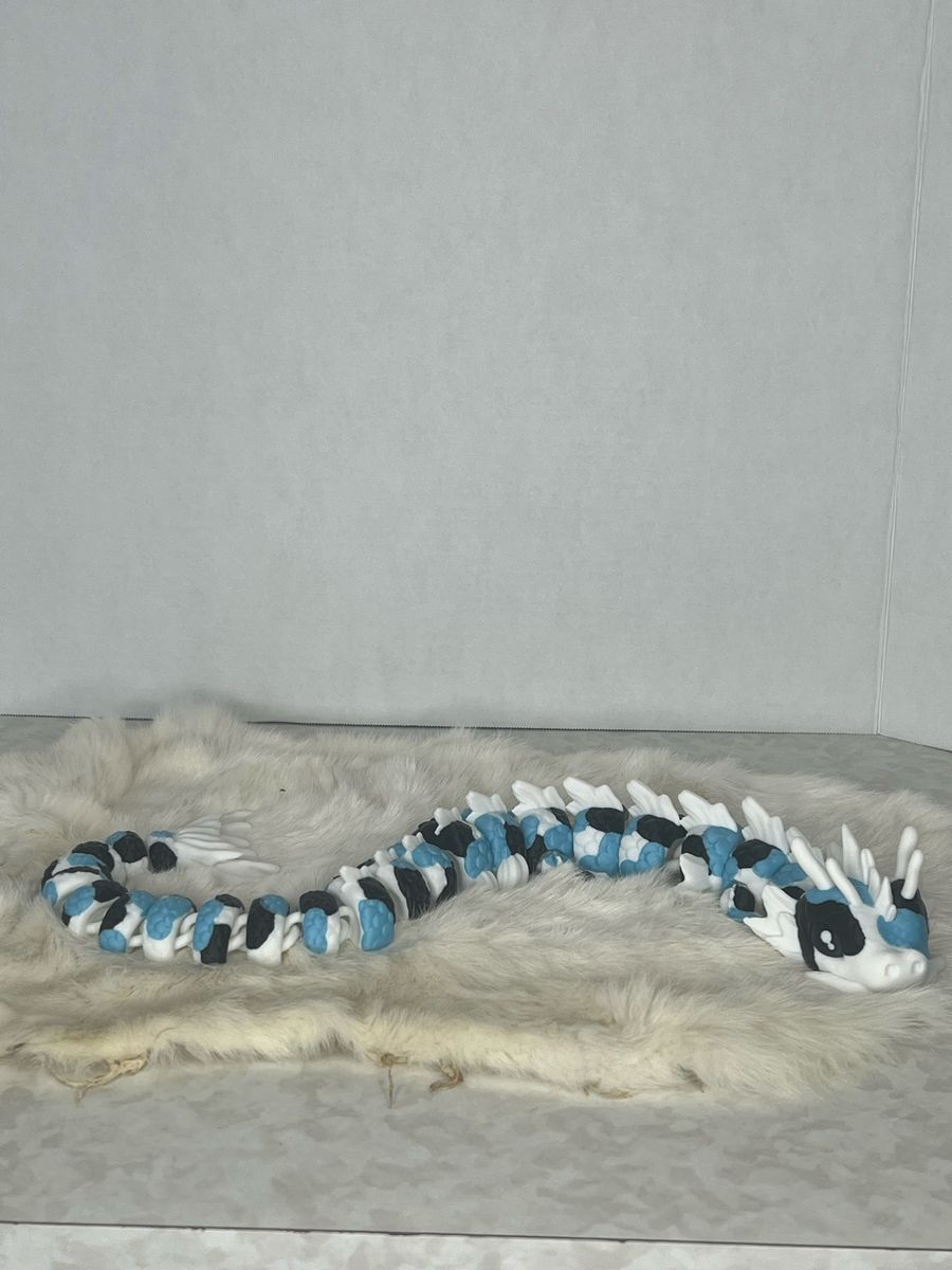 Articulated Koi Dragon Fidget Toy - Glow in the dark Blue, Black, and White