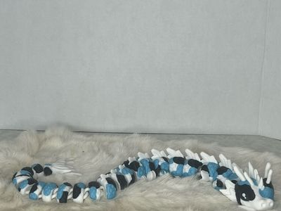 Articulated Koi Dragon Fidget Toy - Glow in the dark Blue, Black, and White