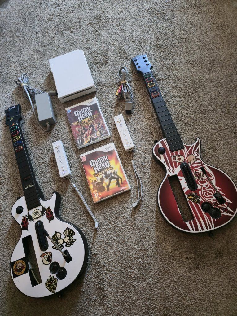Nintendo Wii Console Bundle with 2 Guitar Hero Controllers, Remotes, Cables & World Tour Game