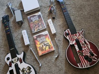 Nintendo Wii Console Bundle with 2 Guitar Hero Controllers, Remotes, Cables & World Tour Game