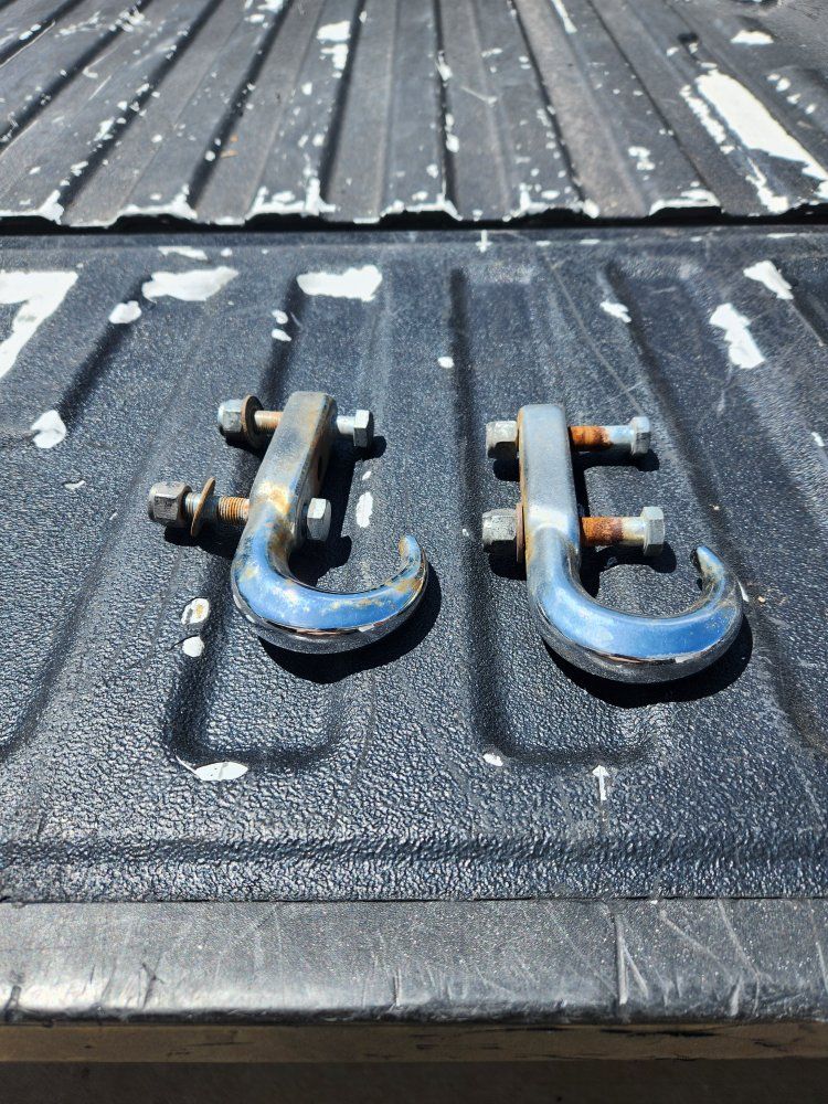 Chrome frame mounted tow hooks