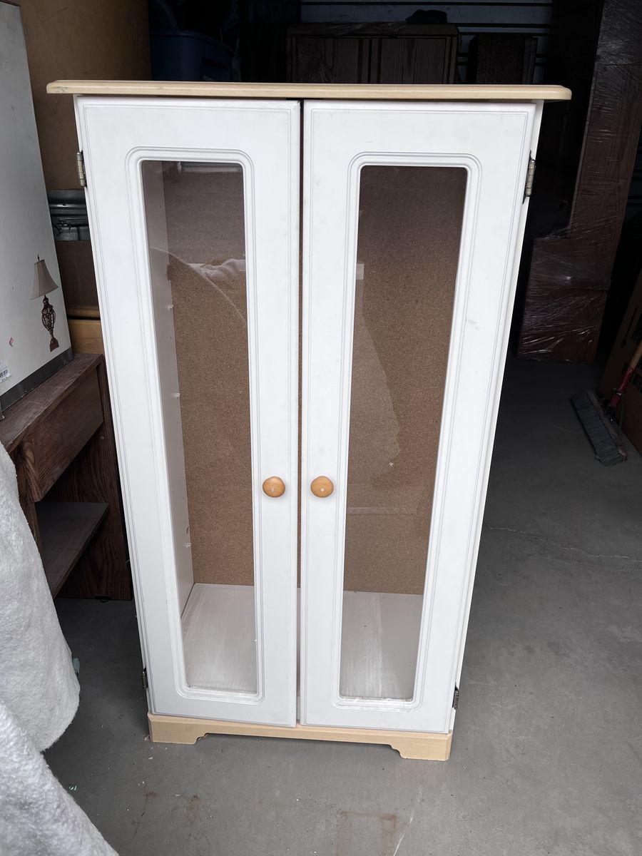 White cabinet with glass doors