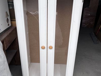 White cabinet with glass doors