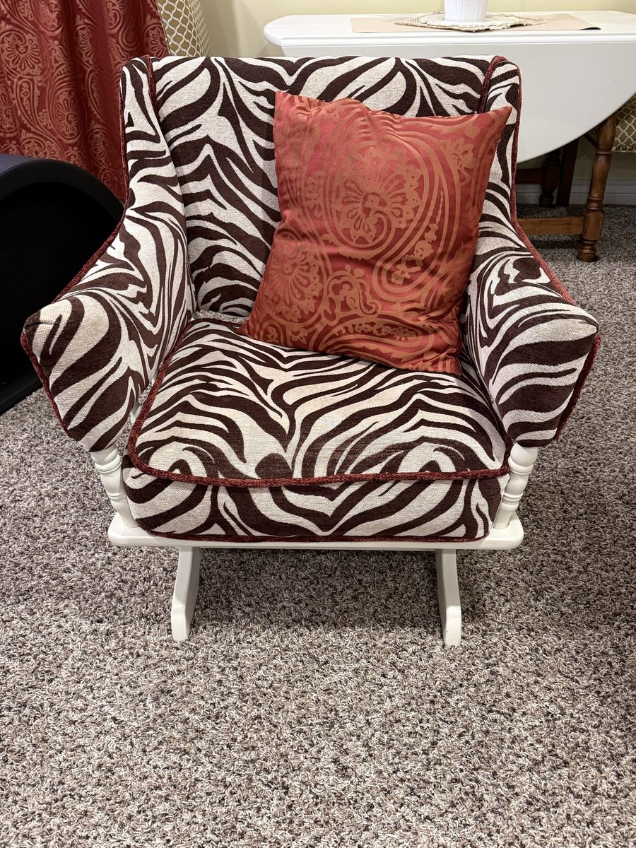 Zebra Print Rocking Chair with Rust Colored Trim + matching ottoman. Unique & Comfortable Seating