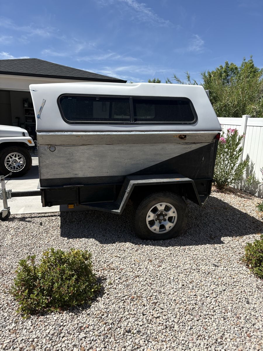 Homemade camper on a heavy duty straight axle trailer 