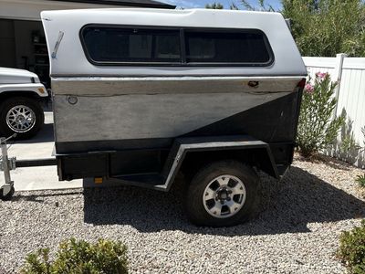 Homemade camper on a heavy duty straight axle trailer