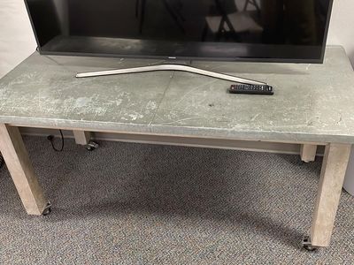 5-Foot Wood Table with Faux-Stone Top – $50