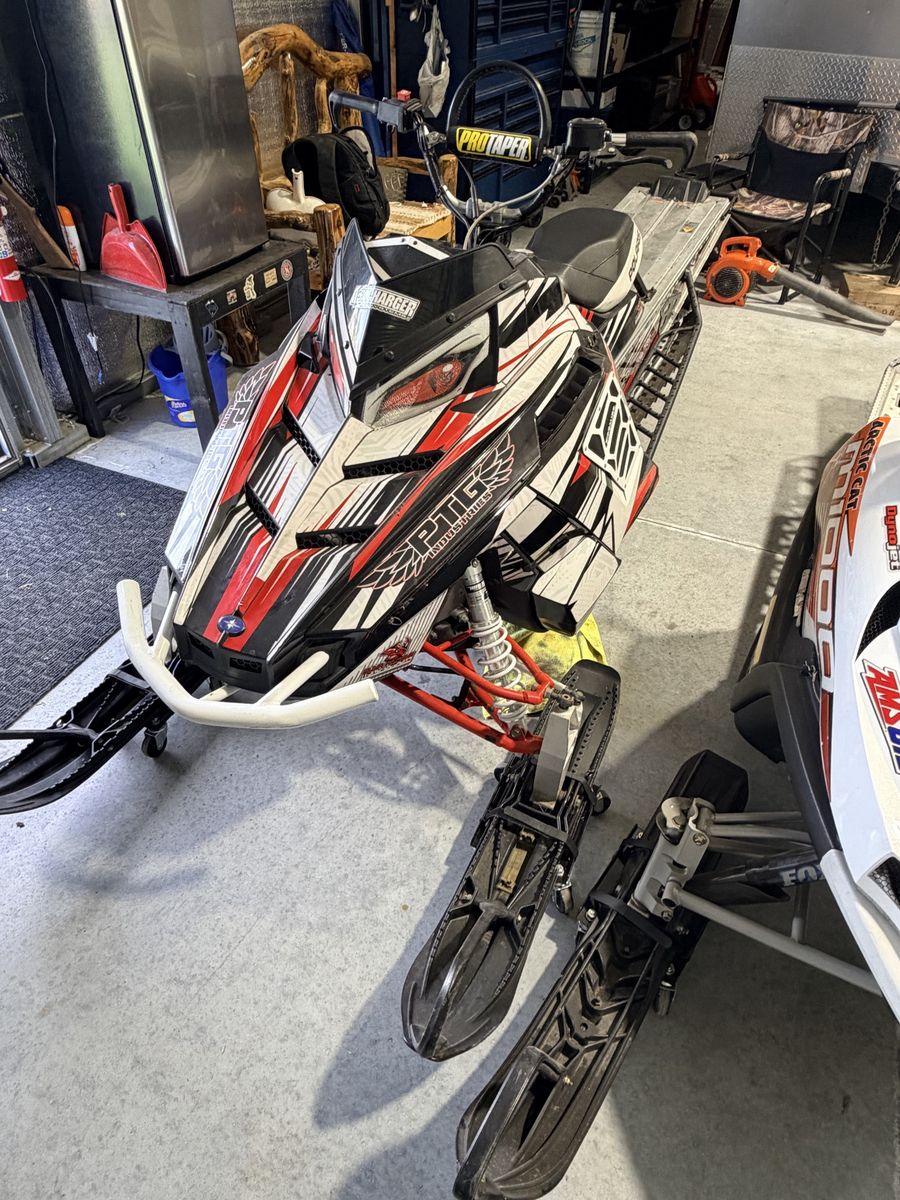 2012 Polaris and 2009 Arctic Cat  Snowmobiles