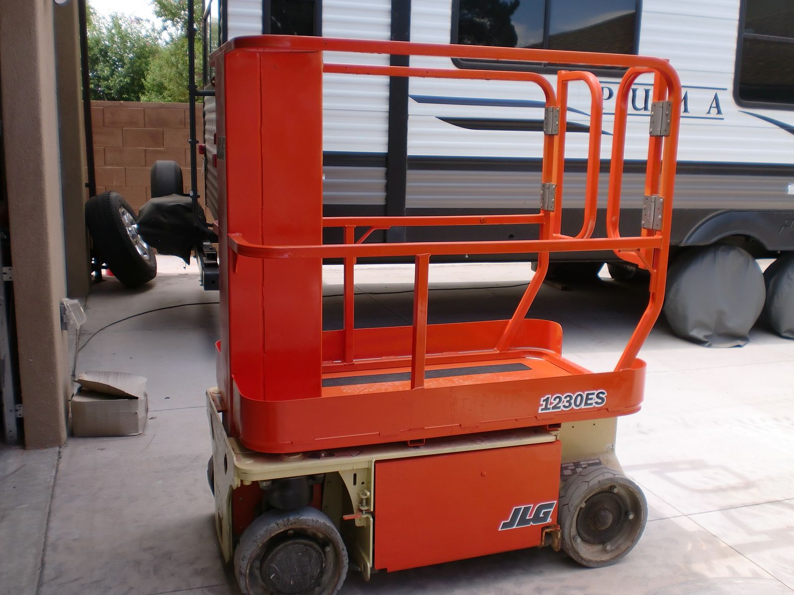2015 JLG 1230 es Scissor Lift