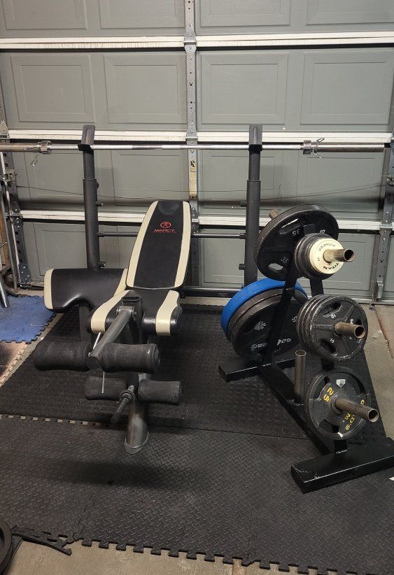 Bench and 250 pounds of weights 