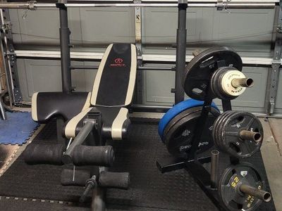 Bench and 250 pounds of weights