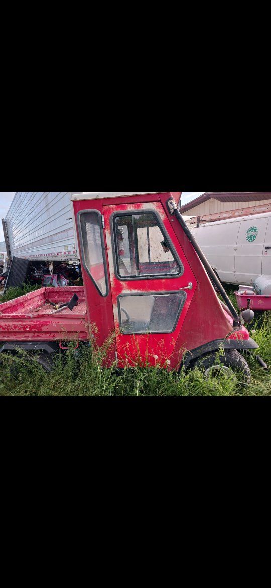 Kawasaki Mule 4WD Utility Vehicle with Full Cab Enclosure